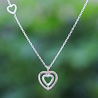 Rose gold and sterling silver pendant necklace, 'Dual Hearts' - Rose Gold and Sterling Silver Necklace
