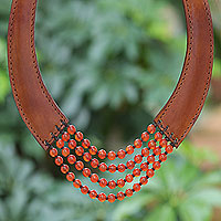 Leather and carnelian pendant necklace, 'Rustic Chic in Orange' - Artisan Crafted Leather and Carnelian Pendant Necklace