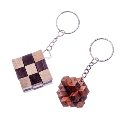 Wood keychains, 'Snake and Falling Star' (pair) - Real Wood Puzzle Keychains (Pair)