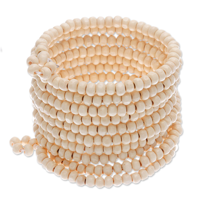 Wood beaded wrap bracelet, 'Ivory Spin' (2.5 In) - Wide Off White Beaded Wood Wrap Bracelet with Bells (2.5 In)