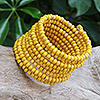 Wood beaded wrap bracelet, 'Sunshine Spin' (2.5 In) - Wide Yellow Beaded Wood Wrap Bracelet with Bells (2.5 In)