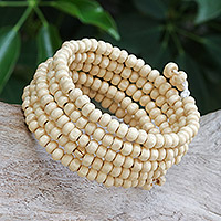 Wood beaded wrap bracelet, 'Ivory Spin' (1 in) - Off White Beaded Wood Wrap Bracelet with Bells (1 In)