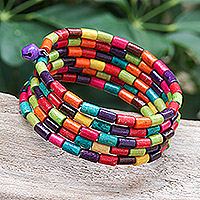 Wood beaded wrap bracelet, 'Confetti Spin' (1 in) - Multicolor Wood Cylinder Beaded Bracelet with Bells (1 In)