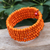 Wood beaded wrap bracelet, 'Tangerine Spin' (1 in) - Orange Beaded Wood Wrap Bracelet with Bells (1 In) (image 2b) thumbail