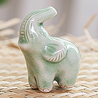 Celadon ceramic figurine, 'Happy Elephant in Green' - Green Celadon Ceramic Figurine