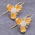 Gold-plated cubic zirconia drop earrings, 'Golden Petals' - Gold-Plated Cubic Zirconia Drop Earrings with Floral Motif