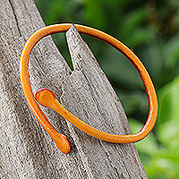 Leather cuff bracelet, 'Young Bud in Orange' - Thai Handmade Unisex Dyed Leather Cuff Bracelet in Orange