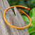 Manschettenarmband aus Leder - Thailändisches handgefertigtes Unisex-Manschettenarmband aus gefärbtem Leder in Orange