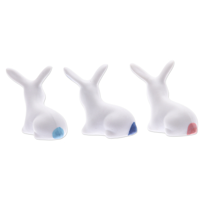 Ceramic figurines, 'Lucky Friends' (set of 3) - Set of 3 Ceramic Bunny Figurines in Pink and Blue Tones