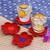 Untersetzer aus Baumwolle, (4er-Set) - Set mit 4 Untersetzern aus gehäkelter Baumwolle mit Blumenmuster in Rottönen