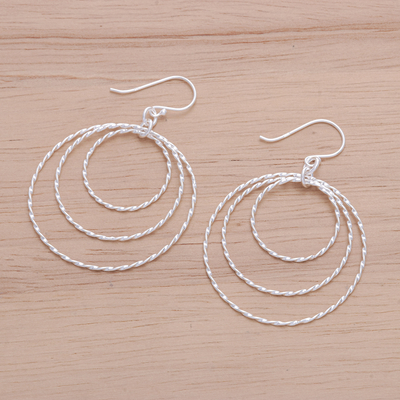 Sterling silver dangle earrings, 'Avant-Garde Swirls' - Polished Sterling Silver Dangle Earrings Crafted in Thailand