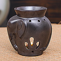 Ceramic oil warmer, 'Prosperity Essence' - Handcrafted Ceramic Elephant Oil Warmer in Black Tone