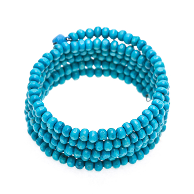 Wood beaded wrap bracelet, 'Sunshine Spin' (1 in) - Handcrafted Blue Wood Beaded Wrap Bracelet with Bells (1 In)
