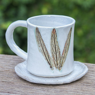 Ceramic mug and saucer, 'Lovely Leaves' - Handcrafted Leaf-Themed Ceramic Mug and Saucer Set