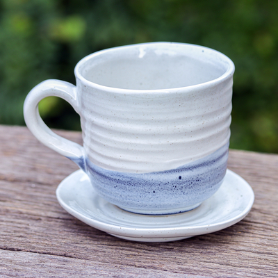 Ceramic cup and saucer, 'Whimsical Cat' - Handcrafted Ceramic Cup and Saucer Set with Cat Motif