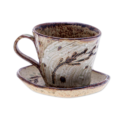 Ceramic cup and saucer, 'Leafy Warmth' - Handcrafted Leafy Brown Ceramic Cup and Saucer from Thailand