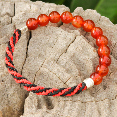 Carnelian beaded stretch bracelet, 'Fearless Journey' - Carnelian Beaded Stretch Bracelet in Red and Black