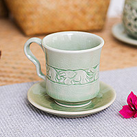 Celadon ceramic cup and saucer, 'Chic Elephant' - Celadon Ceramic Cup and Saucer with Elephant Motif