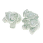 Celadon ceramic figurines, 'Green Elephant Cheer' (pair) - Pair of Celadon Ceramic Elephant Figurines in Green