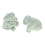 Celadon ceramic figurines, 'Green Elephant Cheer' (pair) - Pair of Celadon Ceramic Elephant Figurines in Green