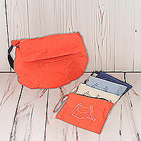 Nesting travel bags, 'Roam Ready' (set of 2) - Waterproof Wristlet and Messenger Bag Nesting Travel Set