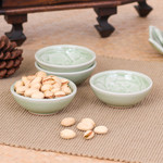 Celadon ceramic appetizer bowls, 'Elephant Herd' (set of 4) - 4 Green Celadon Ceramic Elephant Themed Appetizer Bowls