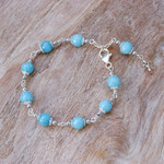 Hematite station bracelet, 'Blue Rosary' - Hematite and Glass Beaded Rosary Bracelet with Silver Cross