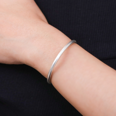 Sterling silver cuff bracelet, 'Sophisticated Harmony' - Polished Sterling Silver Cuff Bracelet Crafted in Thailand
