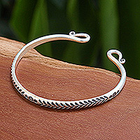 Sterling silver cuff bracelet, 'Sophisticated Serenity' - Polished Sterling Silver Cuff Bracelet with Hill Tribe Motif