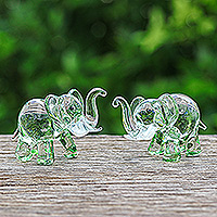 Handblown glass figurines, 'The Green Giants' (pair) - Pair of Green-Toned Handblown Glass Elephant Figurines