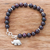 Garnet beaded charm bracelet, 'Passionate Grace' - Natural Garnet Beaded Bracelet with Elephant Charm