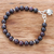 Garnet beaded charm bracelet, 'Passionate Grace' - Natural Garnet Beaded Bracelet with Elephant Charm