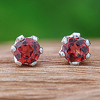 Garnet stud earrings, 'Perseverance Blooms' - Faceted Red Garnet Sterling Silver Stud Earrings