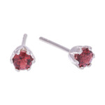 Garnet stud earrings, 'Perseverance Blooms' - Faceted Red Garnet Sterling Silver Stud Earrings