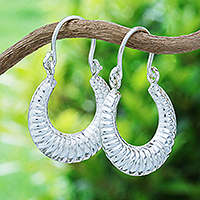 Sterling silver hoop earrings, 'Adventurous' - Polished Sterling Silver Hoop Earrings from Thailand