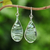 Handblown glass dangle earrings, 'Green Ovate Leaf' - Handblown Glass Dangle Earrings with Green & White Spirals