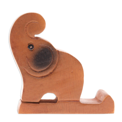 Wood phone holder, 'Gentle Assistant' - Hand-Carved Brown Elephant Raintree Wood Phone Holder