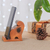 Wood phone holder, 'Gentle Assistant' - Hand-Carved Brown Elephant Raintree Wood Phone Holder