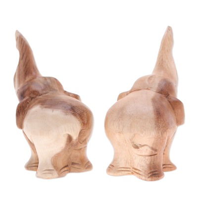 Wood sculptures, 'Twin Greeting' (set of 2) - Set of 2 Hand-Carved Elephant Raintree Wood Sculptures