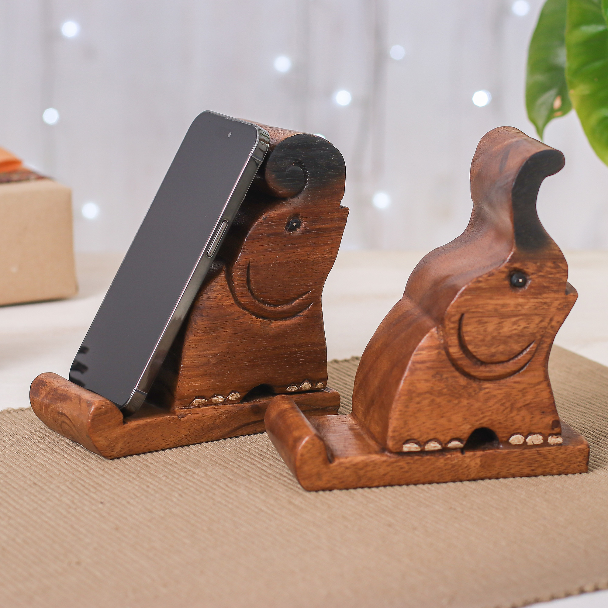 Set of Two Hand-Carved Elephant Raintree Wood Phone Holders, 'Giant Help