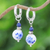 Lapis lazuli and ceramic hoop dangle earrings, 'Noble Duo' - Traditional Floral Lapis Lazuli and Ceramic Dangle Earrings (image 2) thumbail