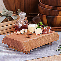 Wood cutting board, 'Delicious Slice' - Hand-Carved Longan Wood Legged Cutting Board from Thailand