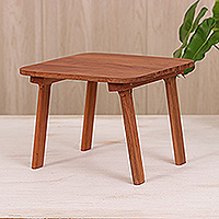 Wood stool, 'Discreet Comfort' - Hand-Carved Minimalist Brown Longan Wood Stool from Thailand
