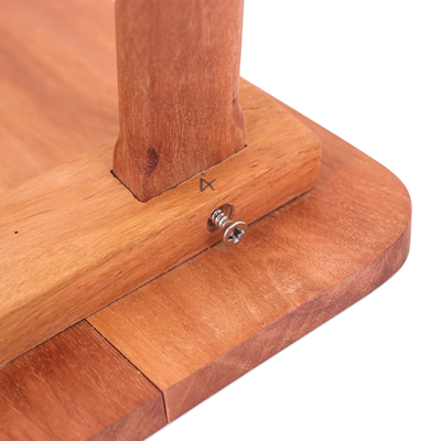 Wood stool, 'Discreet Comfort' - Hand-Carved Minimalist Brown Longan Wood Stool from Thailand