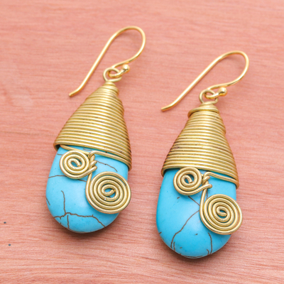 Magnesite and brass dangle earrings, 'Peaceful Swirls' - Polished Brass Dangle Earrings with Light Blue Magnesite
