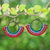 Magnesite beaded macrame dangle earrings, 'Audacious Nimbus' - Green Macrame Dangle Earrings with Red Magnesite Beads