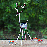 Iron tealight holder, 'Winter Reindeer in Red' - Handcrafted Iron Reindeer Tealight Holder in White and Red