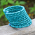 Wood beaded wrap bracelet, 'Turquoise Spin' (2 in) - Turquoise Wood Beaded Wrap Bracelet with Bells (2 In)