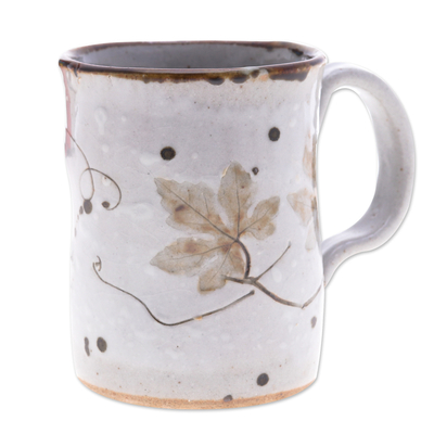Keramikbecher - Handgefertigter Keramikbecher mit Blumenmuster in Braun und Creme