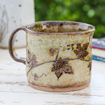 Ceramic cup, 'Thai Eden in Brown' - Crackled Finished Leafy Brown Ceramic Cup from Thailand